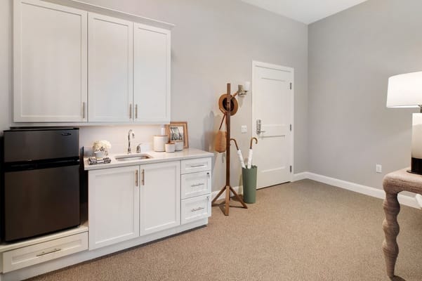 Cozy interior view of a resident's mini kitchen area