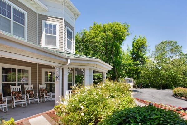 Exterior view of assisted living facility with landscaping