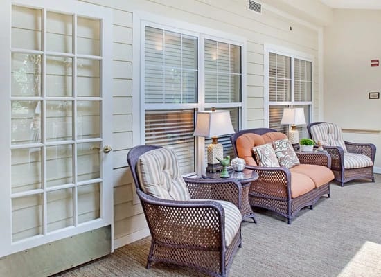 Bright common area with seating and natural light