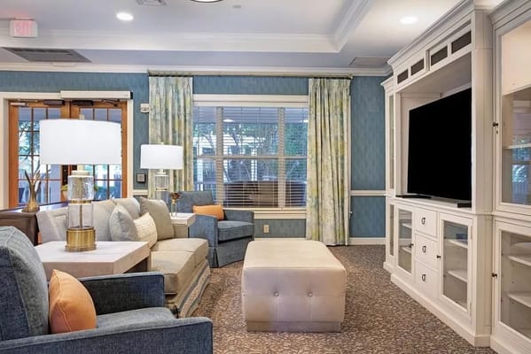 Cozy common area with seating and television