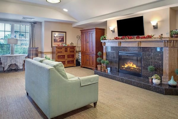 Cozy common area with a fireplace and comfortable seating