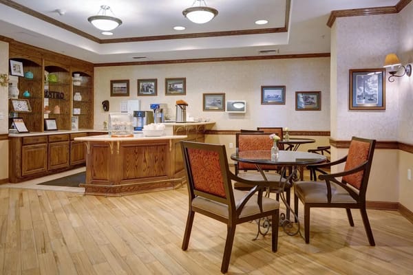Cozy bistro area with wooden counters and seating