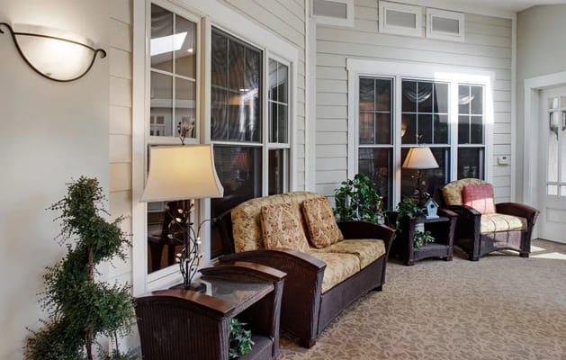 Cozy common area with seating and lamps