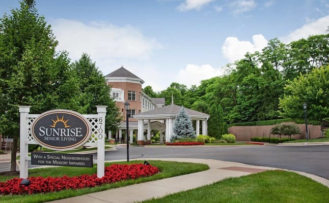 Exterior view of Sunrise Senior Living facility entrance
