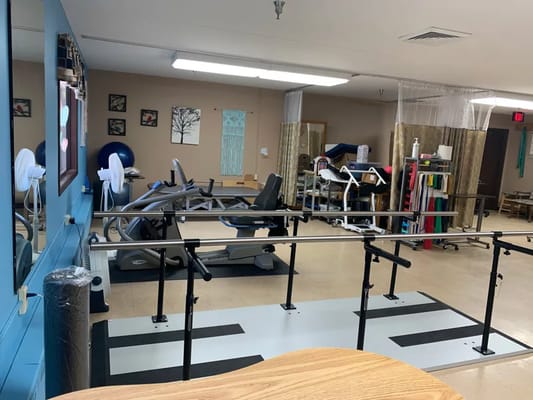 Rehabilitation gym with exercise equipment for residents