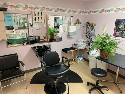 Interior view of a salon area with styling chairs