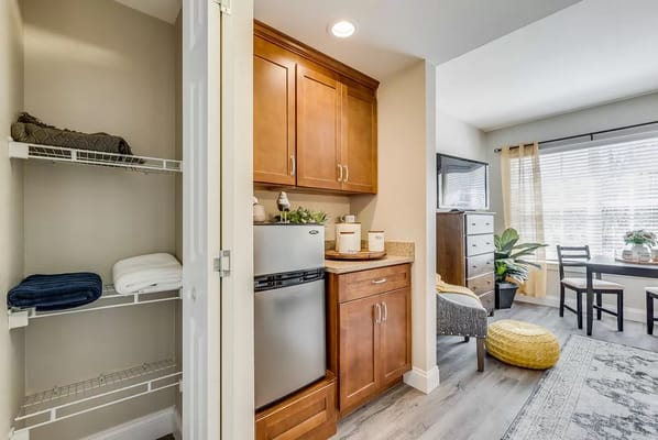 Small kitchenette and living area in a senior apartment