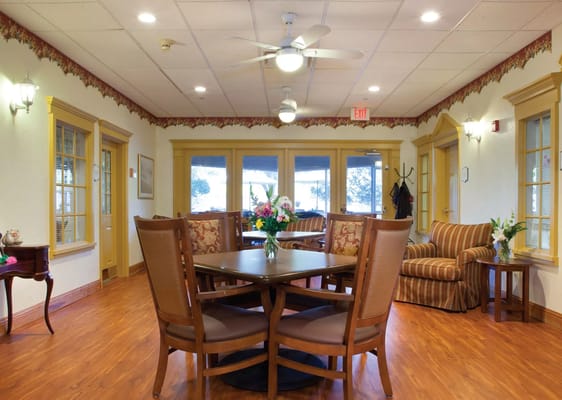 Spacious living room with dining table and seating area.
