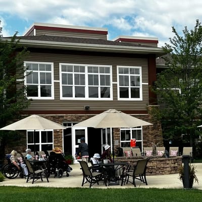 Residents enjoying the outdoor patio area at Terra Vista of Oakbrook Terrace.