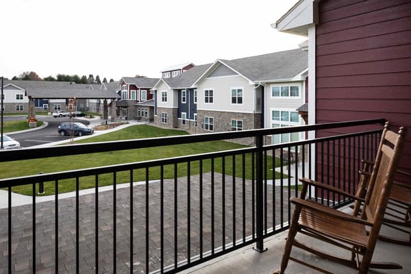 View from a balcony overlooking the courtyard and buildings of Terrace Glen Village.