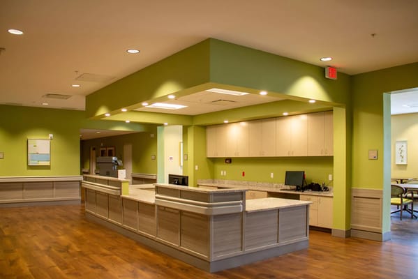 Bright interior reception area of a senior care facility