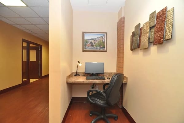 Interior office space with a computer and chair