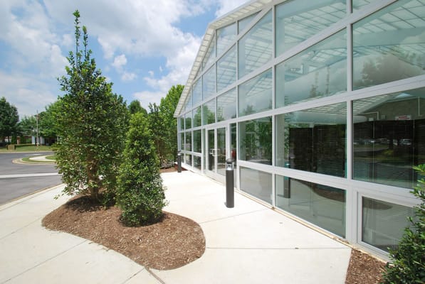 Bright and modern exterior of The Arboretum at Woodland Terrace