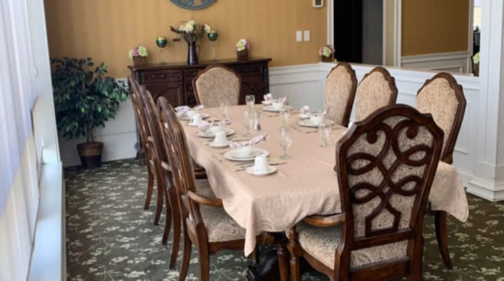 Elegant dining room with a long table set for a meal