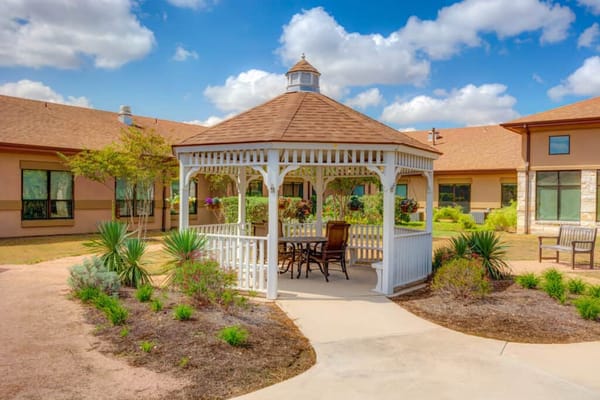 Outdoor gazebo in a landscaped courtyard