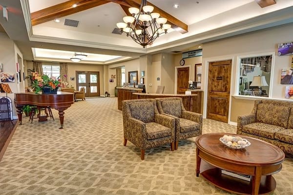 Interior view of a cozy common area with seating