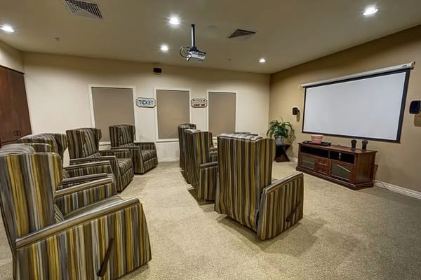 Interior view of a small activity room with seating