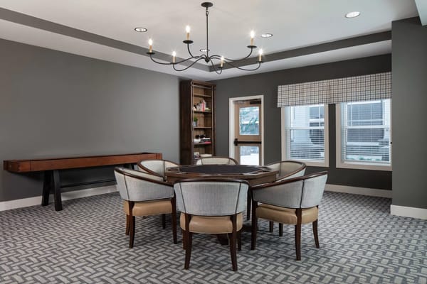 Cozy meeting room with a round table and comfortable chairs