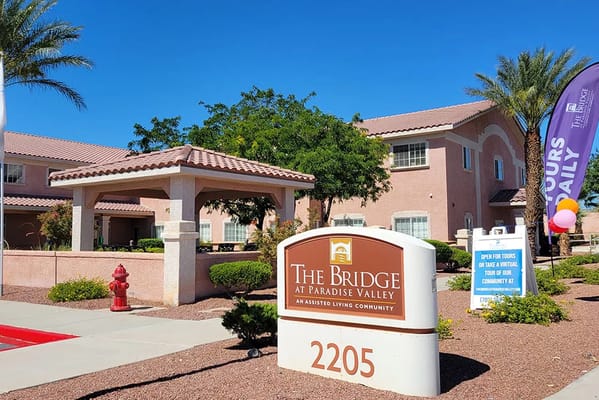 Sign and entrance of The Bridge at Paradise Valley senior living community in Las Vegas