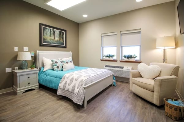 Comfortable private room with bed and seating area