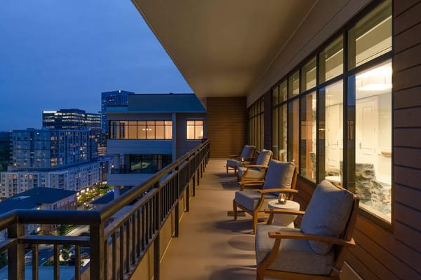 Balcony view with seating at dusk