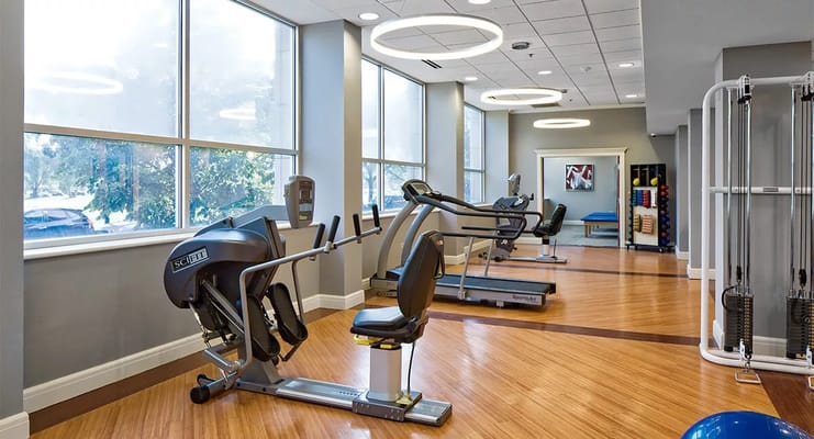 Bright and spacious fitness center with exercise equipment