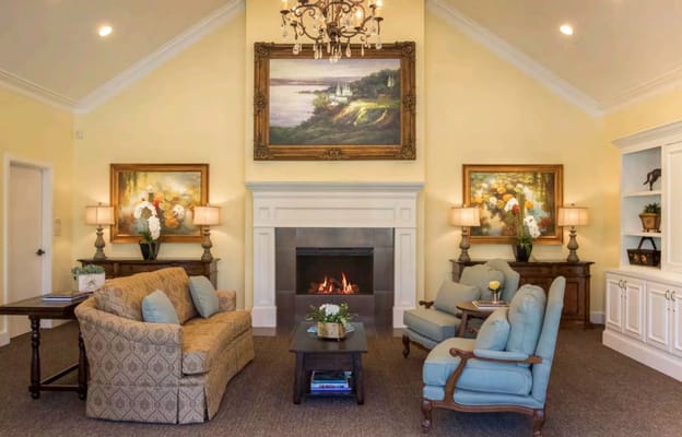 Warm living room with a fireplace and comfortable seating