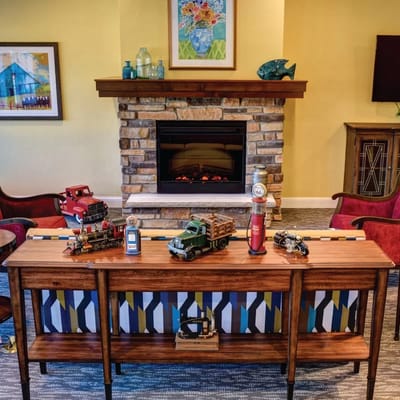 Decorative toys and a fireplace in a welcoming living room