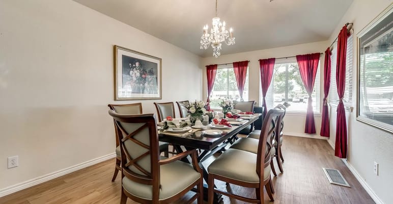 Elegant dining room setup with floral decorations