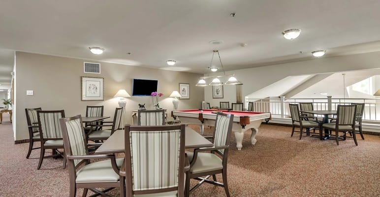 Common area with pool table and seating