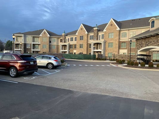 Exterior view of The Farms at Bailey Station with parking area
