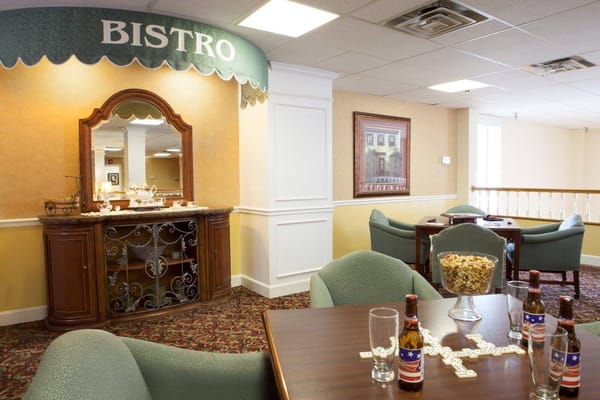 Cozy bistro setting with seating and decorative elements