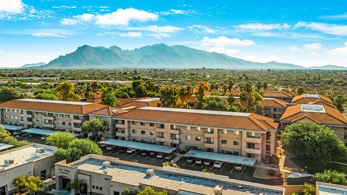Aerial view of The Fountains at La Cholla with mountains in the background