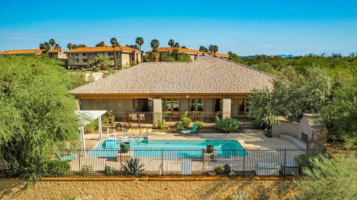 View of the pool area at The Fountains at La Cholla senior living facility.