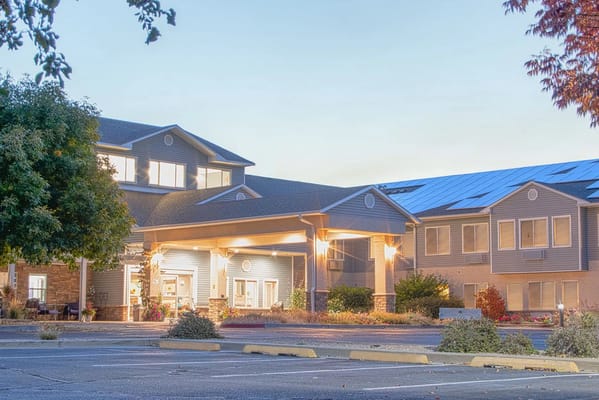 Welcoming entrance of The Fountains of Hilltop senior living facility