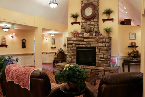 Cozy common area with a fireplace and seating