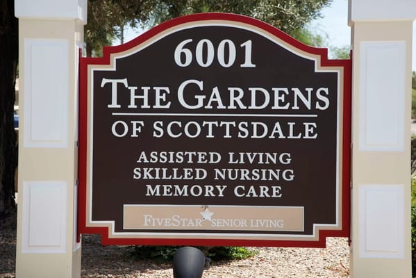 Sign of The Gardens of Scottsdale facility with services listed