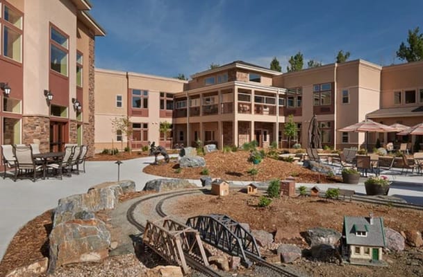 Outdoor courtyard with landscaping and seating areas