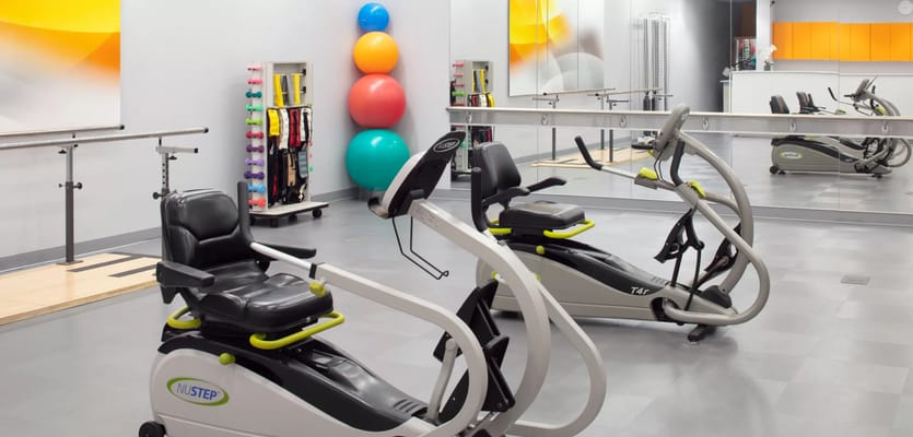 Interior view of a modern exercise room with equipment