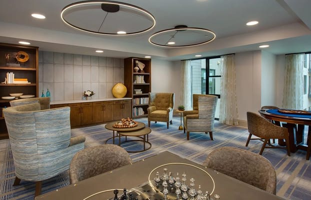 Cozy game room with seating and chess set