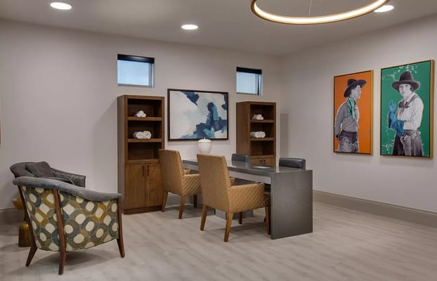 Stylish common area with seating and artwork