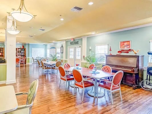 Bright and welcoming dining area with tables and chairs