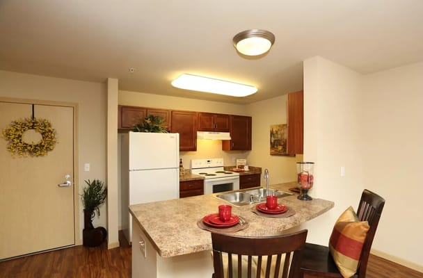 Interior view of a kitchen in a senior living apartment