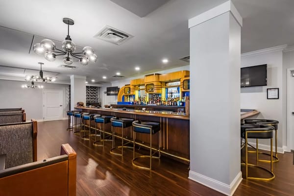 Interior view of a stylish bar area in the facility