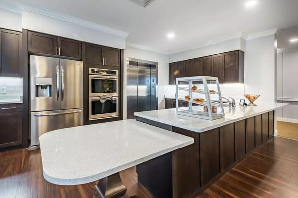 Modern kitchen space with appliances and a serving area