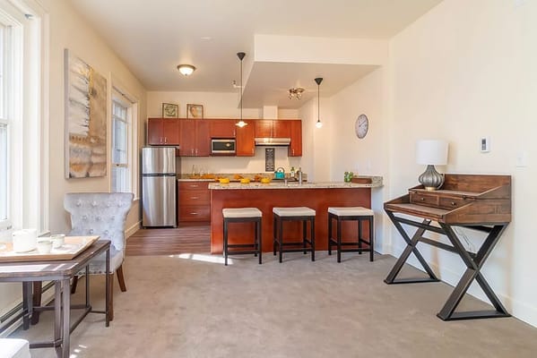 Bright living area with kitchen and dining table