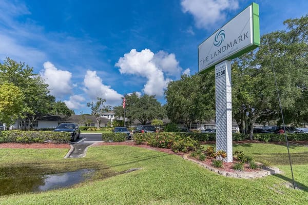 Exterior view of The Landmark facility with signage