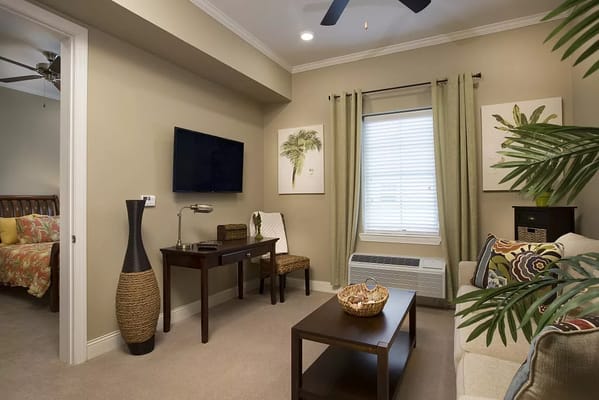 Cozy lobby area with plants and seating