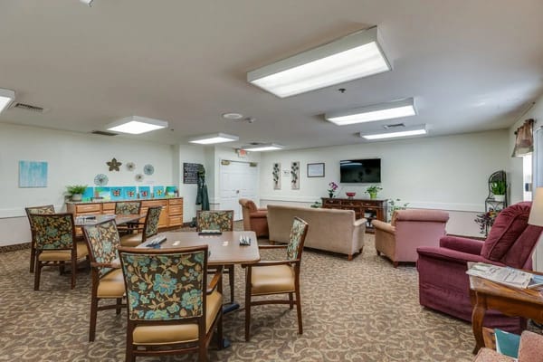 Bright common area with seating and decor