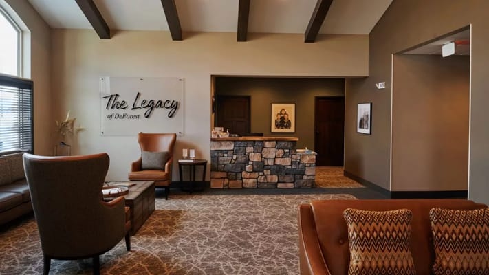 Welcoming lobby with seating at The Legacy of DeForest